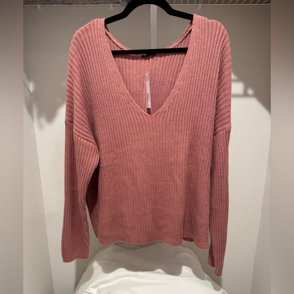 Pink V-neck sweater